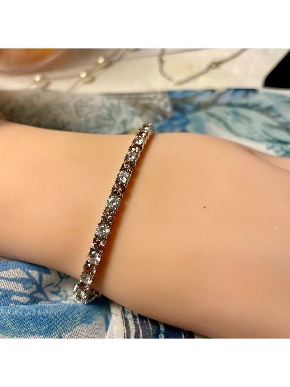 Cubic Zirconium Tennis Bracelet, Marked 925, 7” Clear & Pale Pink Stones.